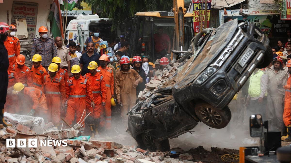 Dozens feared trapped in collapsed building in Delhi